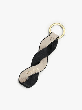 Twister Charm black / milk